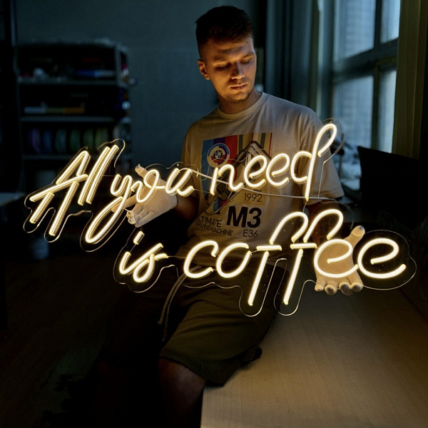 Неоновая вывеска "All you need is coffee"